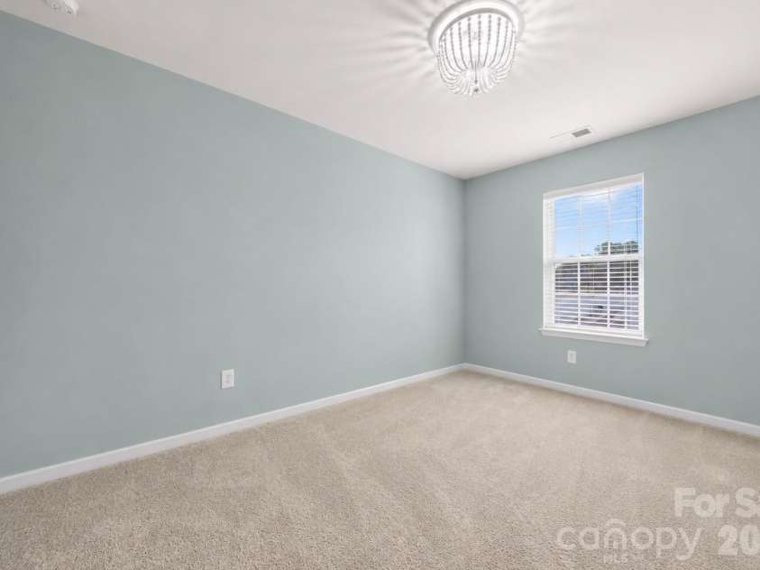 2617 Kinmere Drive, Gastonia, NC 28056.  MLS# CAR4358235, YatesRealty ID 36275. 2nd floor bedroom with updated lighting