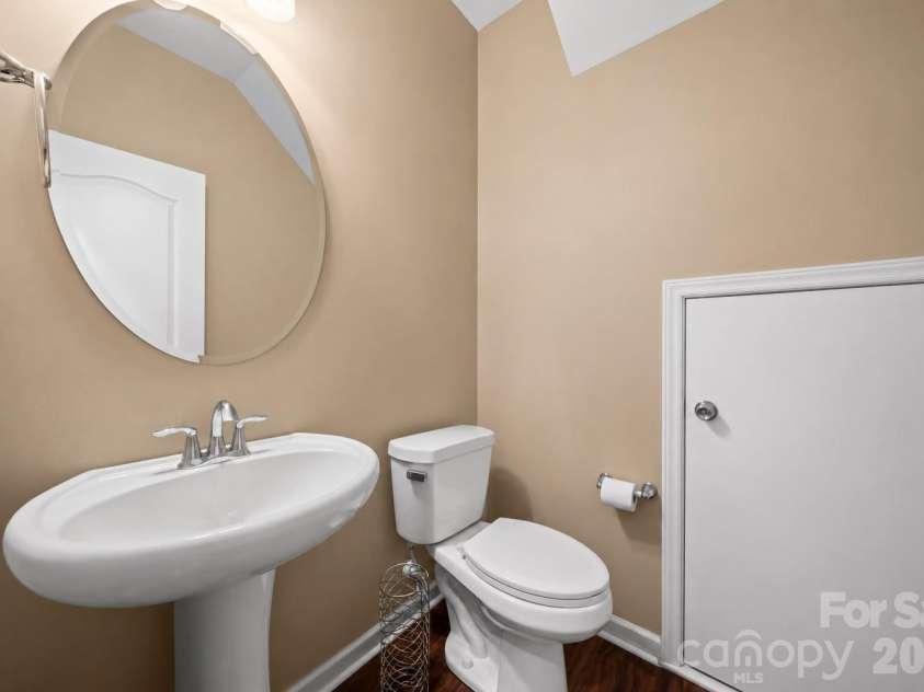2617 Kinmere Drive, Gastonia, NC 28056.  MLS# CAR4358235, YatesRealty ID 36275. Main floor half bath - built in storage added under stairwell