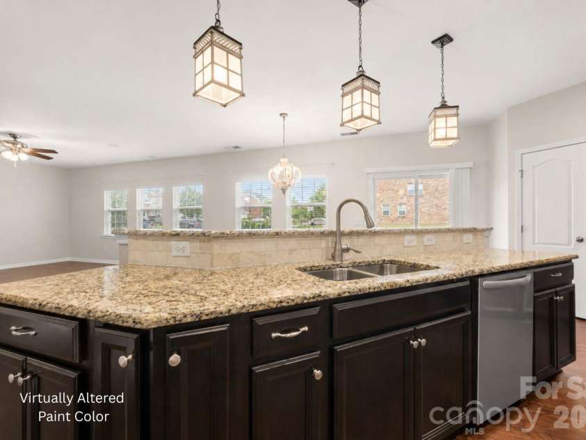 2617 Kinmere Drive, Gastonia, NC 28056.  MLS# CAR4358235, YatesRealty ID 36275. Virtually altered paint color - kitchen and living room