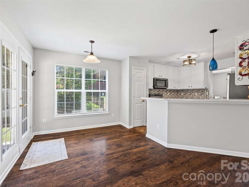 7076 White Bluff Drive, Tega Cay, SC 29708.  MLS# CAR4400835, YatesRealty ID 36276. Breakfast bar