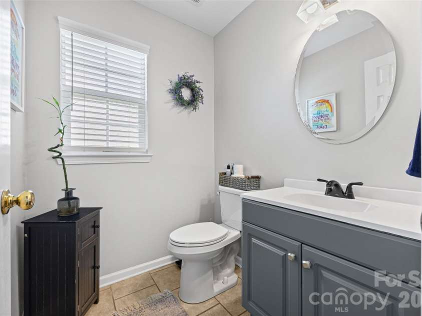 7076 White Bluff Drive, Tega Cay, SC 29708.  MLS# CAR4400835, YatesRealty ID 36276. First floor bathroom
