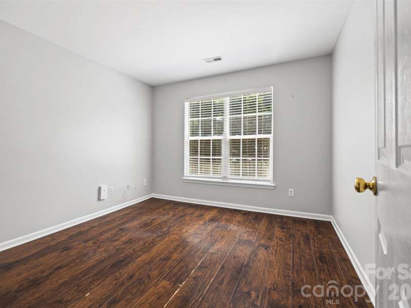7076 White Bluff Drive, Tega Cay, SC 29708.  MLS# CAR4400835, YatesRealty ID 36276. Office/ first floor bedroom