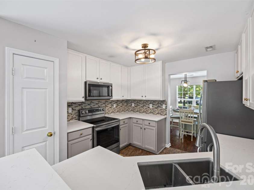7076 White Bluff Drive, Tega Cay, SC 29708.  MLS# CAR4400835, YatesRealty ID 36276. Pantry