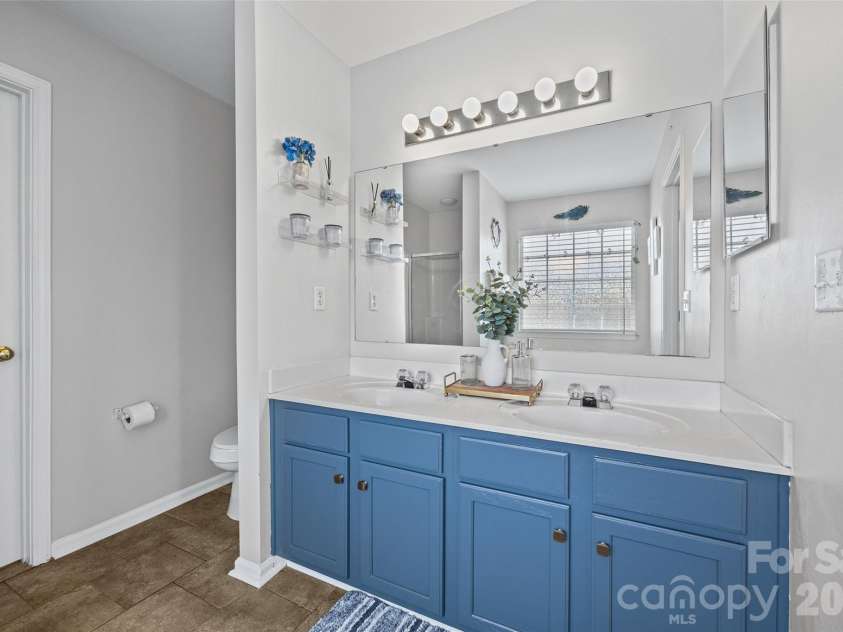 7076 White Bluff Drive, Tega Cay, SC 29708.  MLS# CAR4400835, YatesRealty ID 36276. Primary bathroom