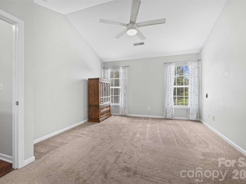 7076 White Bluff Drive, Tega Cay, SC 29708.  MLS# CAR4400835, YatesRealty ID 36276. Primary bedroom