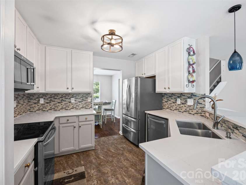 7076 White Bluff Drive, Tega Cay, SC 29708.  MLS# CAR4400835, YatesRealty ID 36276. Quartz countertops