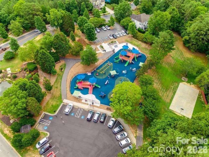 7076 White Bluff Drive, Tega Cay, SC 29708.  MLS# CAR4400835, YatesRealty ID 36276. Trailhead community playground/ park