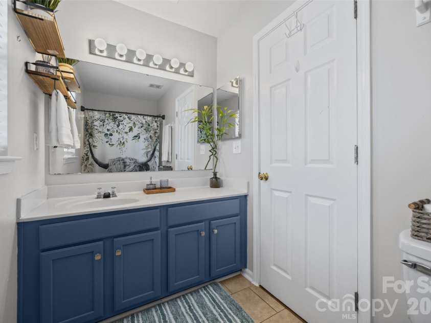 7076 White Bluff Drive, Tega Cay, SC 29708.  MLS# CAR4400835, YatesRealty ID 36276. Upstairs- full bathroom