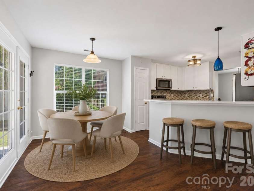 7076 White Bluff Drive, Tega Cay, SC 29708.  MLS# CAR4400835, YatesRealty ID 36276. Virtually staged eat-in kitchen area