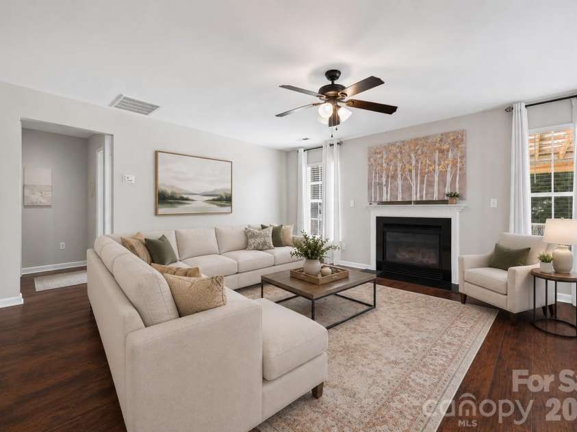 7076 White Bluff Drive, Tega Cay, SC 29708.  MLS# CAR4400835, YatesRealty ID 36276. Virtually staged living room