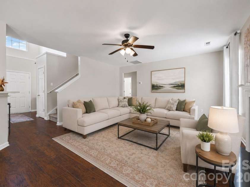 7076 White Bluff Drive, Tega Cay, SC 29708.  MLS# CAR4400835, YatesRealty ID 36276. Virtually staged living room