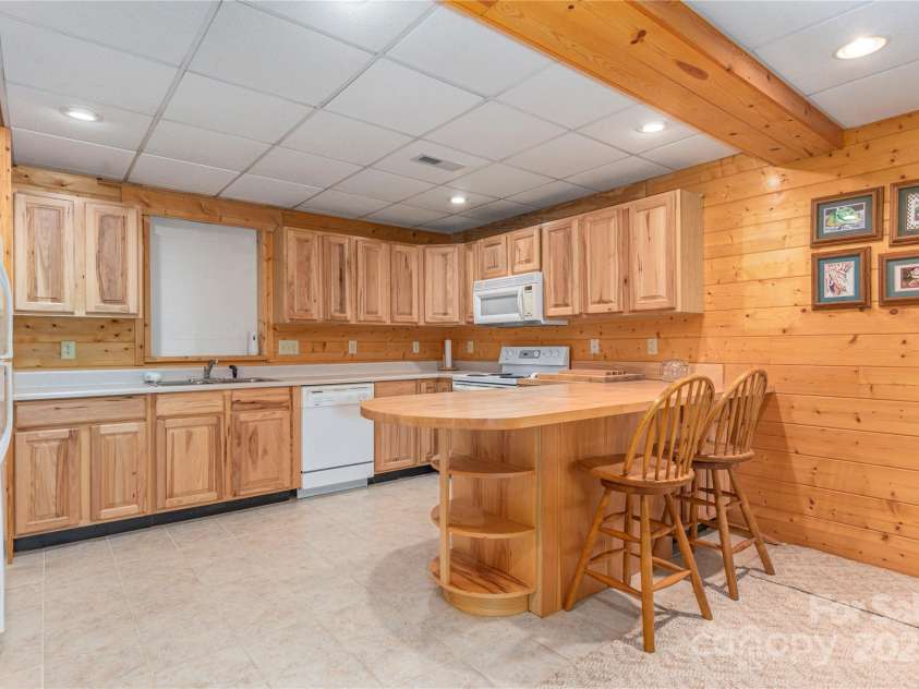 235 Timucua Trail, Waynesville, NC 28786.  MLS# CAR4301389, YatesRealty ID 3628. Breakfast bar.