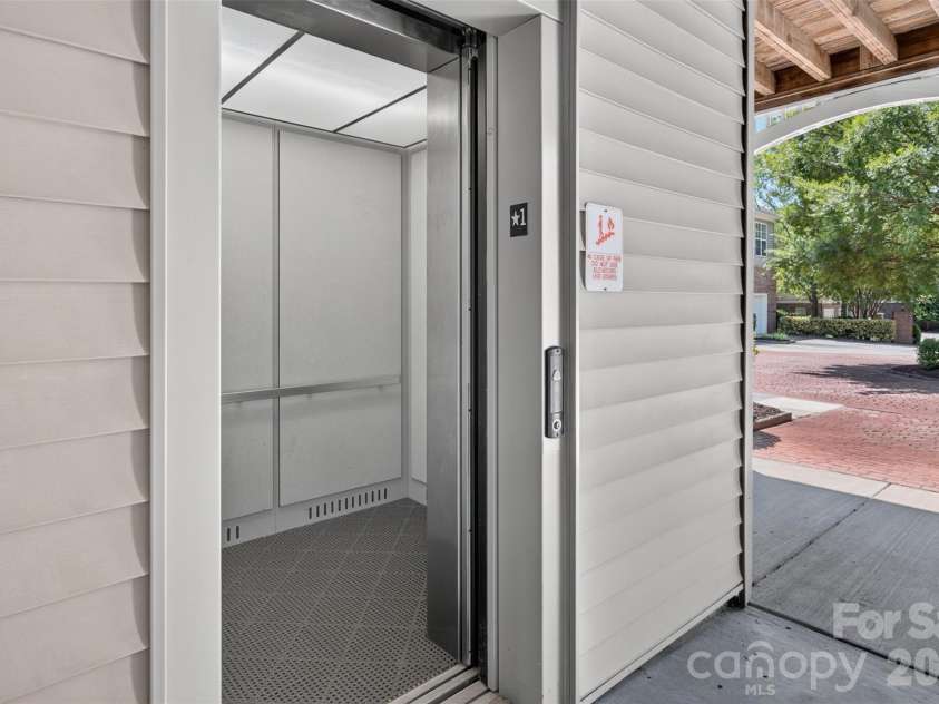8955 Rosalyn Glen Road, Cornelius, NC 28031.  MLS# CAR4396668, YatesRealty ID 36286. Elevator for the building