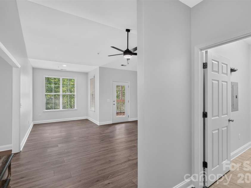 8955 Rosalyn Glen Road, Cornelius, NC 28031.  MLS# CAR4396668, YatesRealty ID 36286. Family Room Area - opens to covered porch