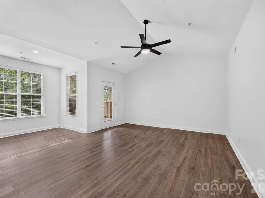 8955 Rosalyn Glen Road, Cornelius, NC 28031.  MLS# CAR4396668, YatesRealty ID 36286. Family Room Opens to Covered Porch