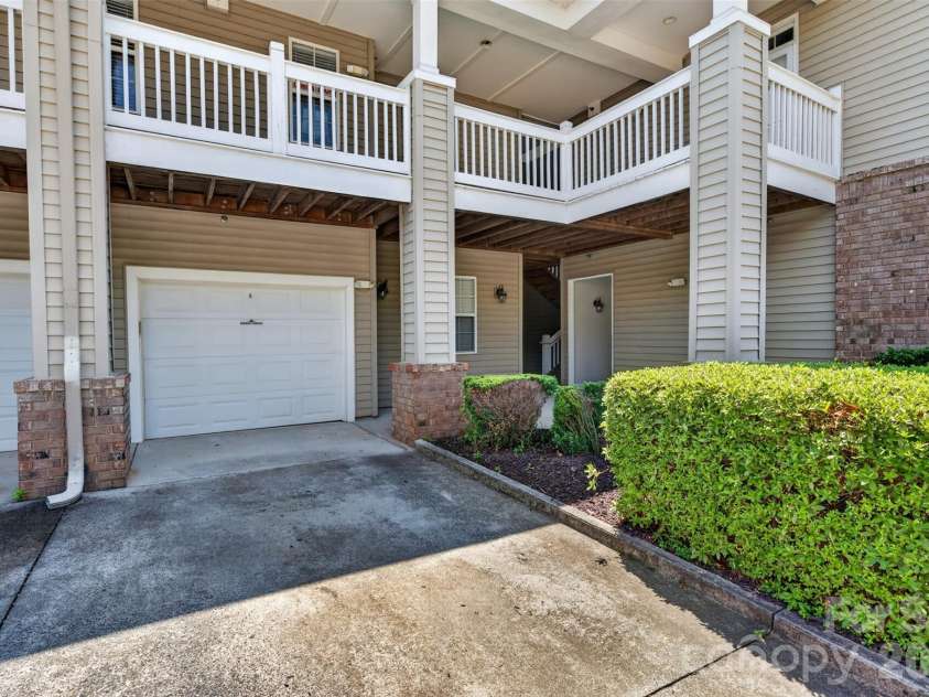 8955 Rosalyn Glen Road, Cornelius, NC 28031.  MLS# CAR4396668, YatesRealty ID 36286. Garage directly under the condo for added convenience