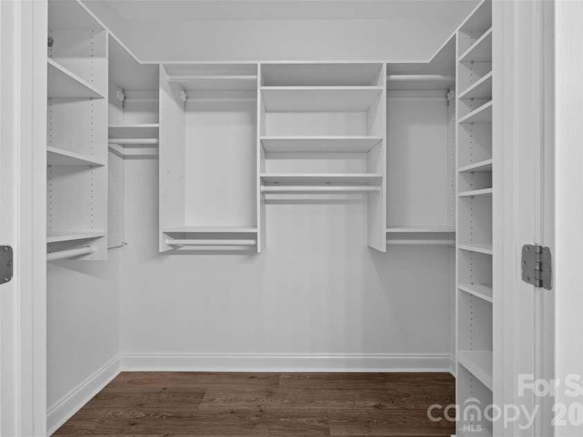 8955 Rosalyn Glen Road, Cornelius, NC 28031.  MLS# CAR4396668, YatesRealty ID 36286. Large custom primary walk in closet