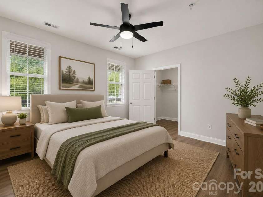 8955 Rosalyn Glen Road, Cornelius, NC 28031.  MLS# CAR4396668, YatesRealty ID 36286. Staged Large 2nd Bedroom with Large walk in closet