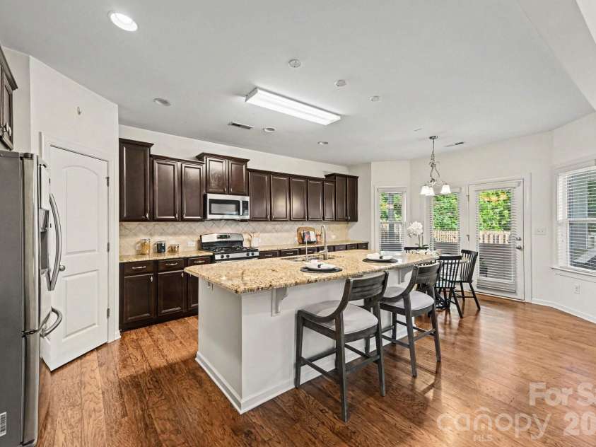 10202 Falling Leaf Drive, Concord, NC 28027.  MLS# CAR4396937, YatesRealty ID 36288. Large Kitchen + Island