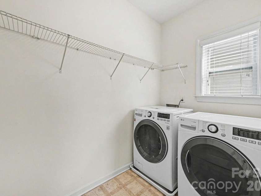10202 Falling Leaf Drive, Concord, NC 28027.  MLS# CAR4396937, YatesRealty ID 36288. Laundry Room: Upstairs