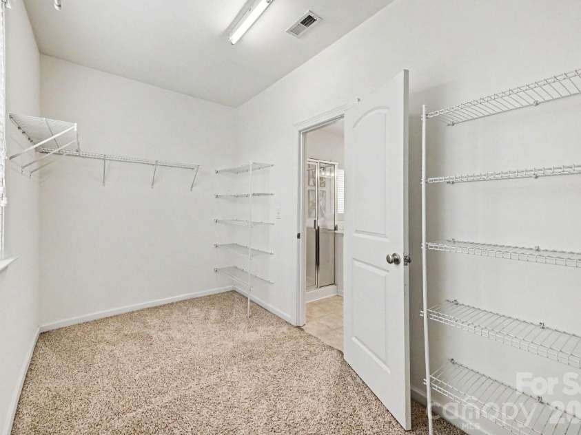 10202 Falling Leaf Drive, Concord, NC 28027.  MLS# CAR4396937, YatesRealty ID 36288. Primary Closet