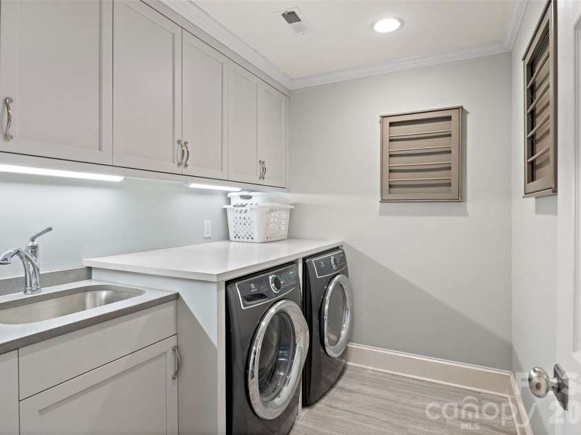 3221 Lazy Branch Road, Charlotte, NC 28270.  MLS# CAR4395496, YatesRealty ID 36290. Upstairs laundry room