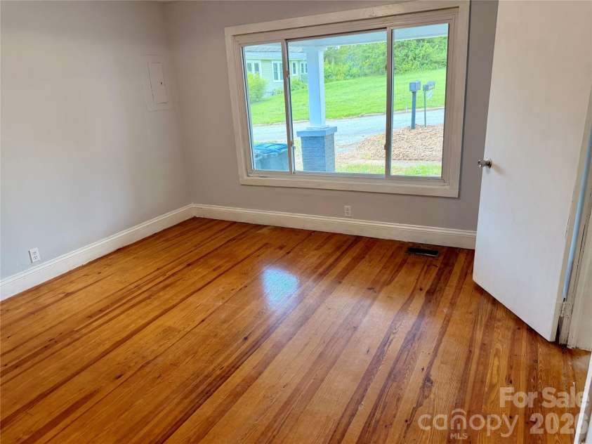 321 Cline Avenue, Valdese, NC 28690.  MLS# CAR4401993, YatesRealty ID 36296. Front bedroom