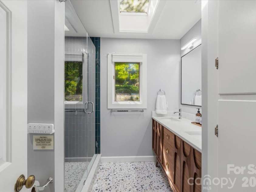 6149 Shore Drive, Nebo, NC 28761.  MLS# CAR4401444, YatesRealty ID 36297. Updated primary bath with custom vanity