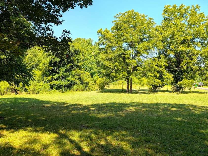 9207 Elgin Drive, Charlotte, NC 28214.  MLS# CAR4401691, YatesRealty ID 36306. Side Yard