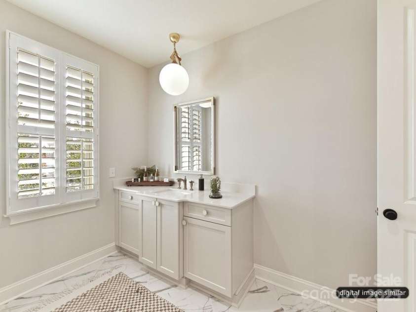 2013 Garden View Lane, Weddington, NC 28104.  MLS# CAR4234729, YatesRealty ID 3631. Separate vanities with great natural light