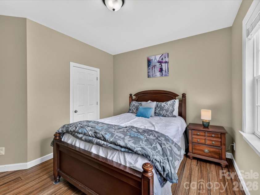 18625 The Commons Boulevard, Cornelius, NC 28031.  MLS# CAR4397710, YatesRealty ID 36310. Bedroom 3 is bright and inviting, offering generous natural light, a spacious closet, and a versatile layout ideal for family, guests, or a home office.