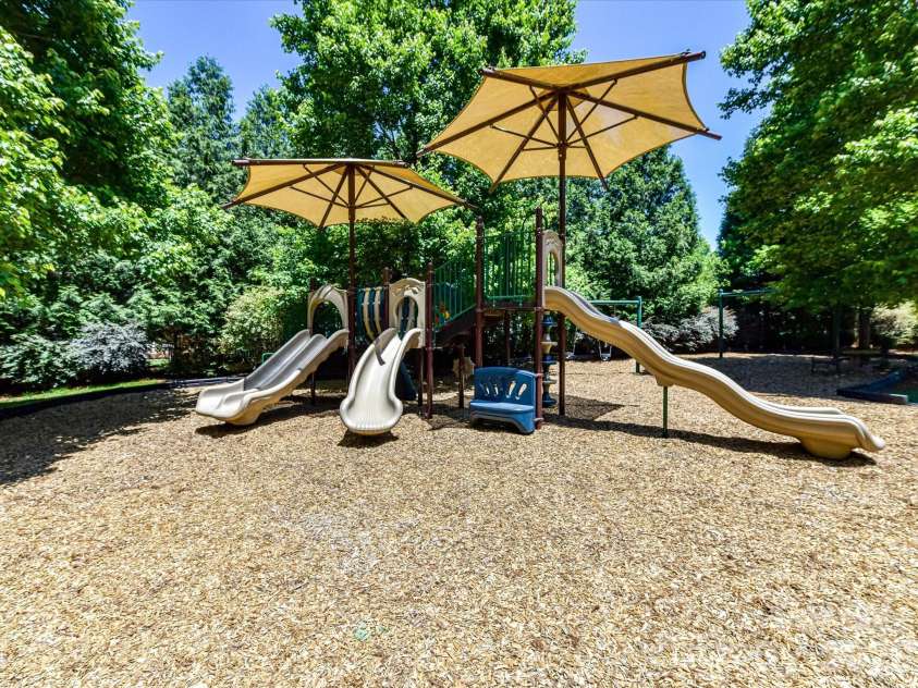 18625 The Commons Boulevard, Cornelius, NC 28031.  MLS# CAR4397710, YatesRealty ID 36310. Community playground with shaded play structures offers a fun and inviting space for children to enjoy just moments from home.
