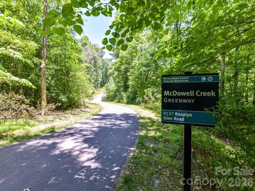 18625 The Commons Boulevard, Cornelius, NC 28031.  MLS# CAR4397710, YatesRealty ID 36310. Direct access to the scenic McDowell Creek Greenway provides miles of paved walking and biking trails surrounded by beautiful natural wooded views.
