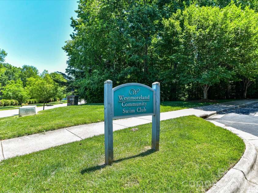 18625 The Commons Boulevard, Cornelius, NC 28031.  MLS# CAR4397710, YatesRealty ID 36310. Residents enjoy access to exceptional community amenities, including a resort-style pool, clubhouse, and beautifully maintained common areas designed for recreation and social gatherings.