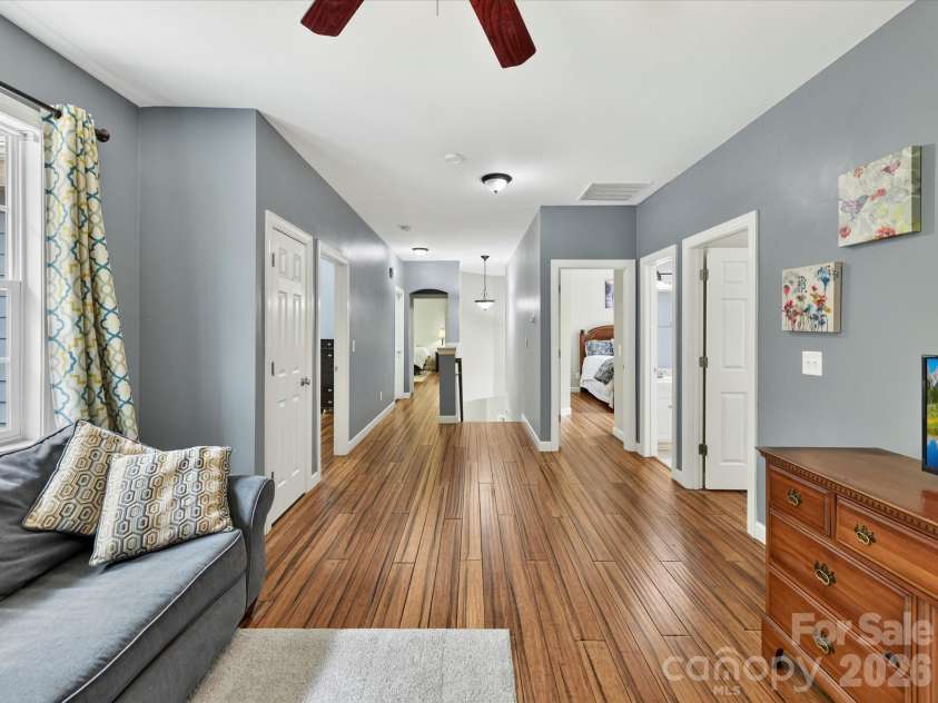 18625 The Commons Boulevard, Cornelius, NC 28031.  MLS# CAR4397710, YatesRealty ID 36310. The spacious flex/bonus room offers endless possibilities as a media room, playroom, home gym, or additional living space to fit your lifestyle.