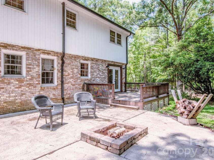 734 Willow Lane, Harrisburg, NC 28075.  MLS# CAR4401220, YatesRealty ID 36311. Fire pit, patio and back deck