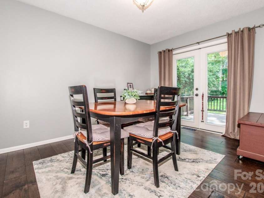 734 Willow Lane, Harrisburg, NC 28075.  MLS# CAR4401220, YatesRealty ID 36311. Formal dining room with walk out to back deck