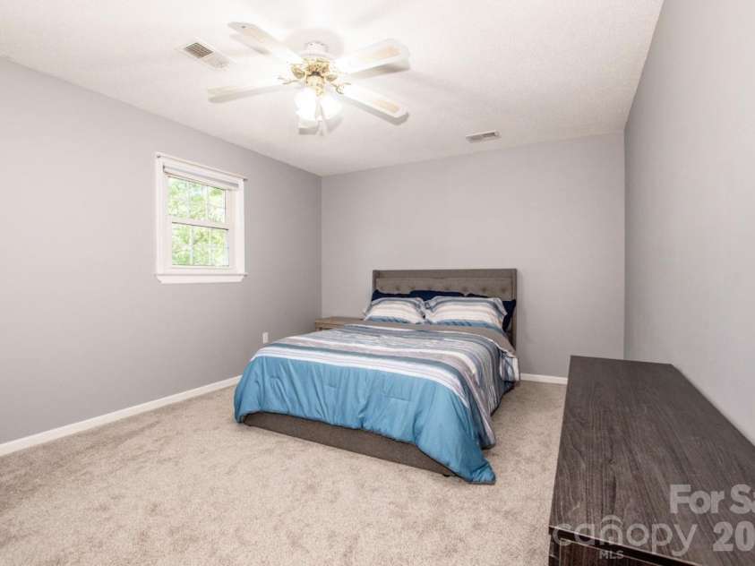 734 Willow Lane, Harrisburg, NC 28075.  MLS# CAR4401220, YatesRealty ID 36311. Secondary Bedroom 2 (front left of home)