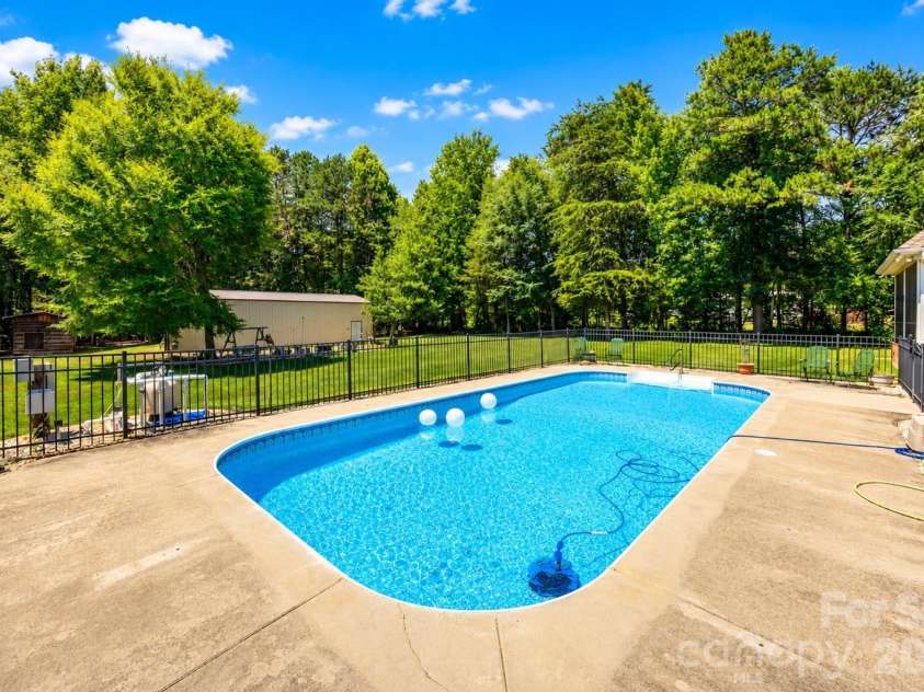 1347 Killian Road, Stanley, NC 28164.  MLS# CAR4397694, YatesRealty ID 36318. Inground Pool
