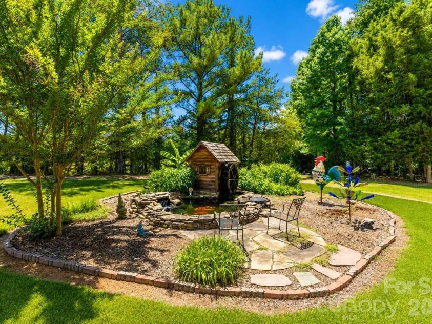 1347 Killian Road, Stanley, NC 28164.  MLS# CAR4397694, YatesRealty ID 36318. Koi Pond