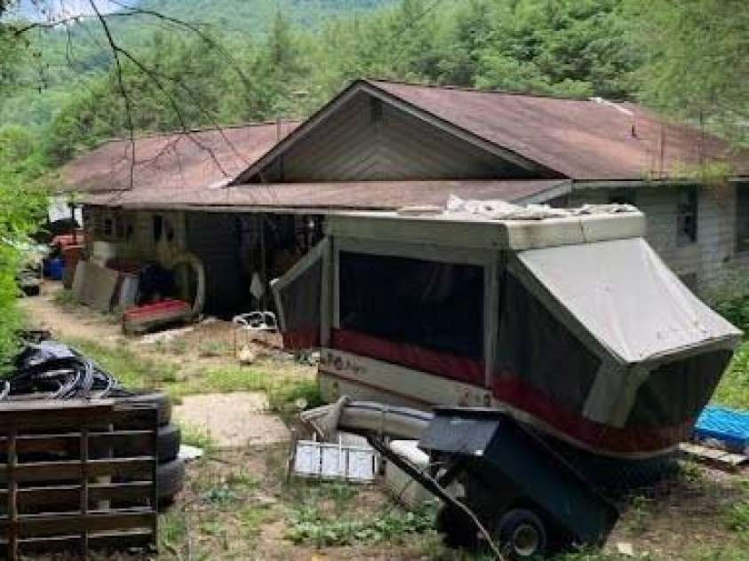 617 Barkers Creek Road, Whittier, NC 28789.  MLS# CAR4340564, YatesRealty ID 3632. Campers, old cars, etc will be removed before closing 