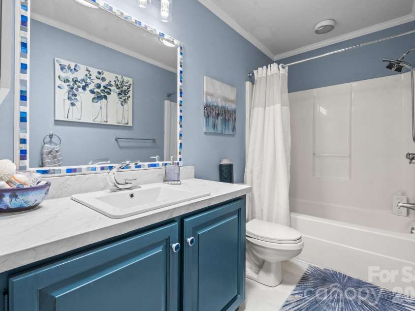 9081 Pittmans Gap Road, Newland, NC 28657.  MLS# CAR4402274, YatesRealty ID 36321. Guest bathroom