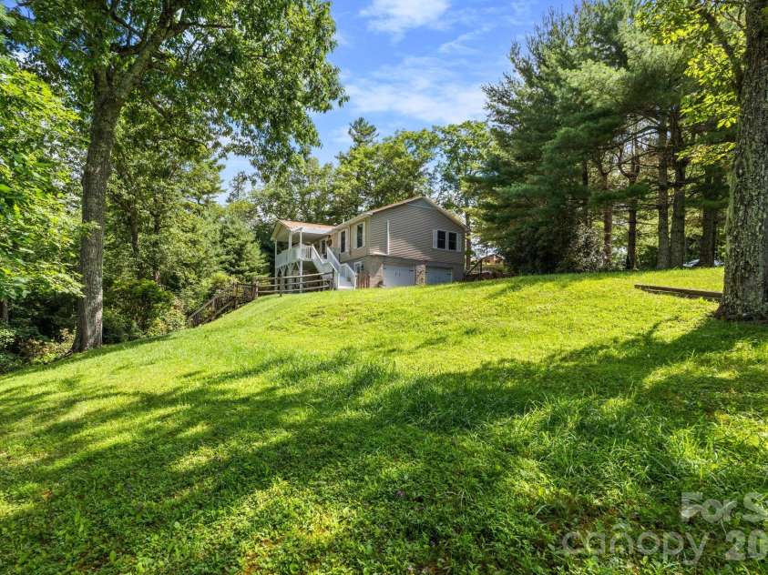 9081 Pittmans Gap Road, Newland, NC 28657.  MLS# CAR4402274, YatesRealty ID 36321. Large lawn