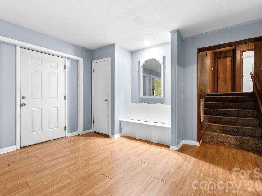 121 Horseshoe Drive, Boone, NC 28607.  MLS# CAR4402623, YatesRealty ID 36322. Half flight to upstairs