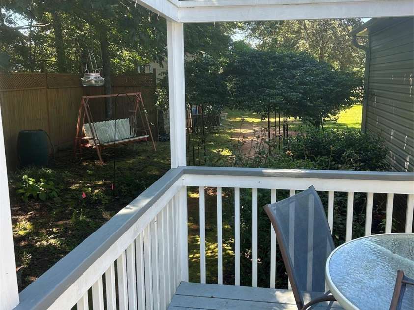 114 Ashford Drive, Olin, NC 28660.  MLS# CAR4271792, YatesRealty ID 36325. Back porch off of kitchen