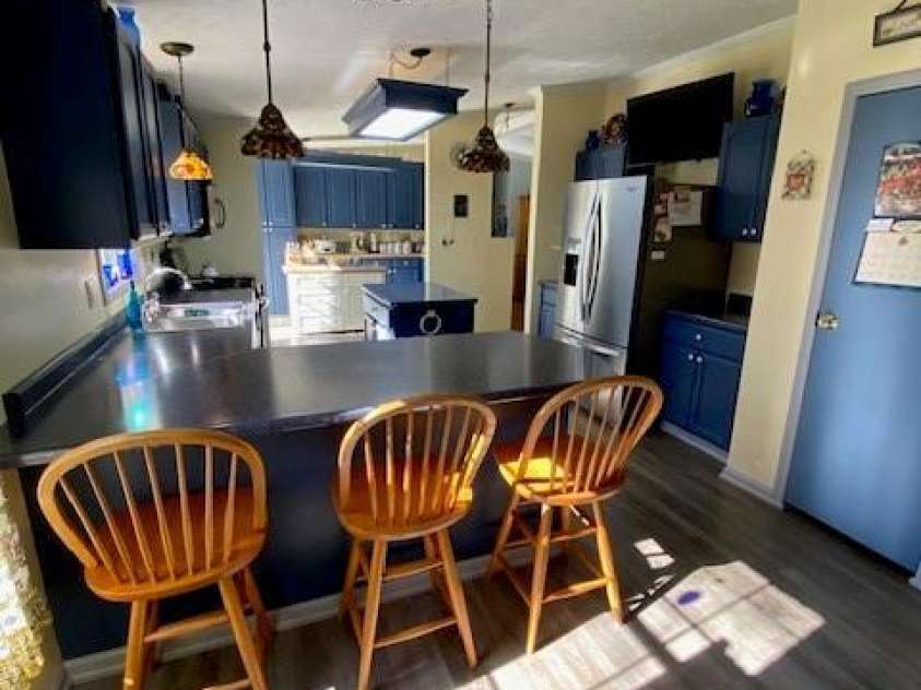 114 Ashford Drive, Olin, NC 28660.  MLS# CAR4271792, YatesRealty ID 36325. Bar