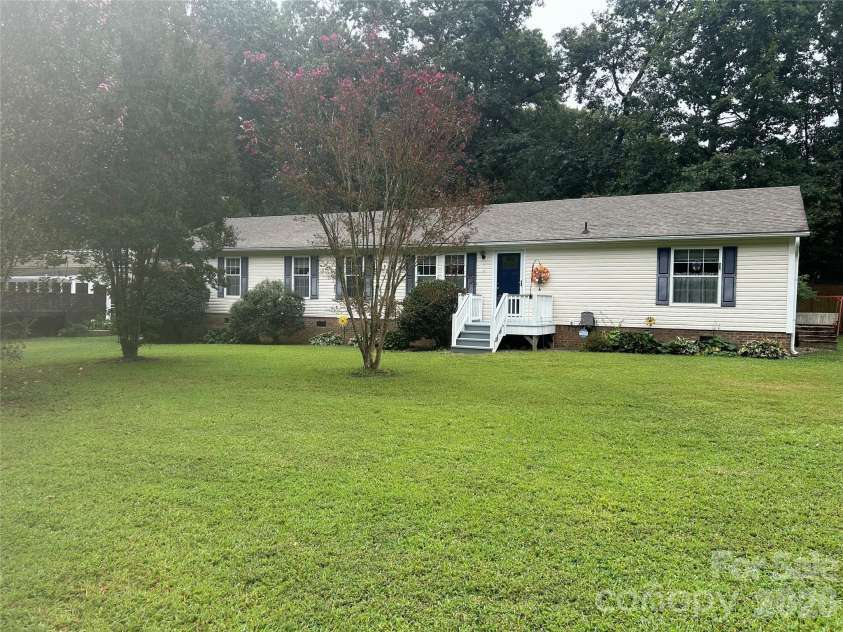 114 Ashford Drive, Olin, NC 28660.  MLS# CAR4271792, YatesRealty ID 36325. Front of house