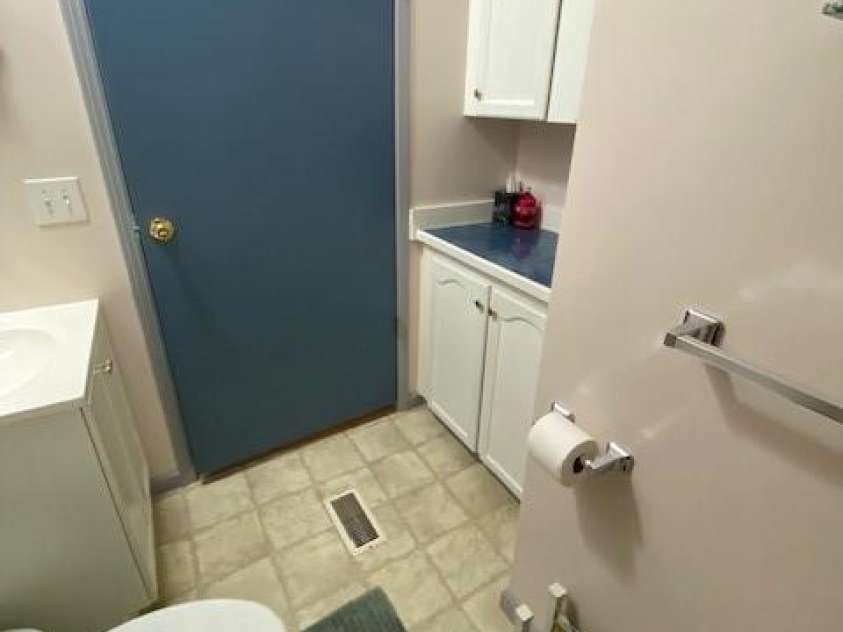 114 Ashford Drive, Olin, NC 28660.  MLS# CAR4271792, YatesRealty ID 36325. Guest bathroom