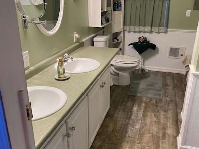 114 Ashford Drive, Olin, NC 28660.  MLS# CAR4271792, YatesRealty ID 36325. Main bath