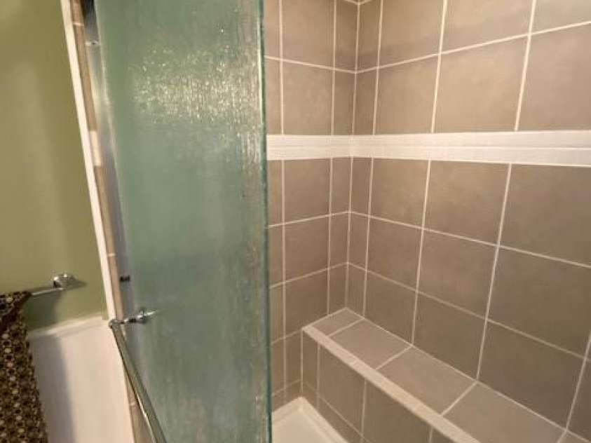 114 Ashford Drive, Olin, NC 28660.  MLS# CAR4271792, YatesRealty ID 36325. Main bath shower